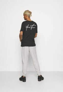 YOURTURN UnisexPantaloni SportiviMottled Light Grey Donna Pantaloni YO121004Q-C11 -Negozio Online Yourturn Italia 44af697d8af34693a7b3385401313f6d