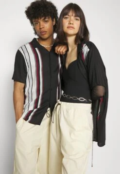 YOURTURN Genderless Parachute - Shorts - White 12 YOURTURN Genderless Parachute - Shorts - White -Negozio Online Yourturn Italia 834f1f83f56e4019a779e61f5e6b9f84