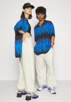 YOURTURN Genderless Parachute UnisexPantaloniWhite Uomo Pantaloni YO12100Y8-A11 -Negozio Online Yourturn Italia f47a0e1ecff04f00b66902953e5c6730