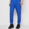 YOURTURN UnisexPantaloni SportiviBlue Donna Pantaloni YO12100NF-K11 -Negozio Online Yourturn Italia f669e5d0ea644452aadac5888d9aadc0
